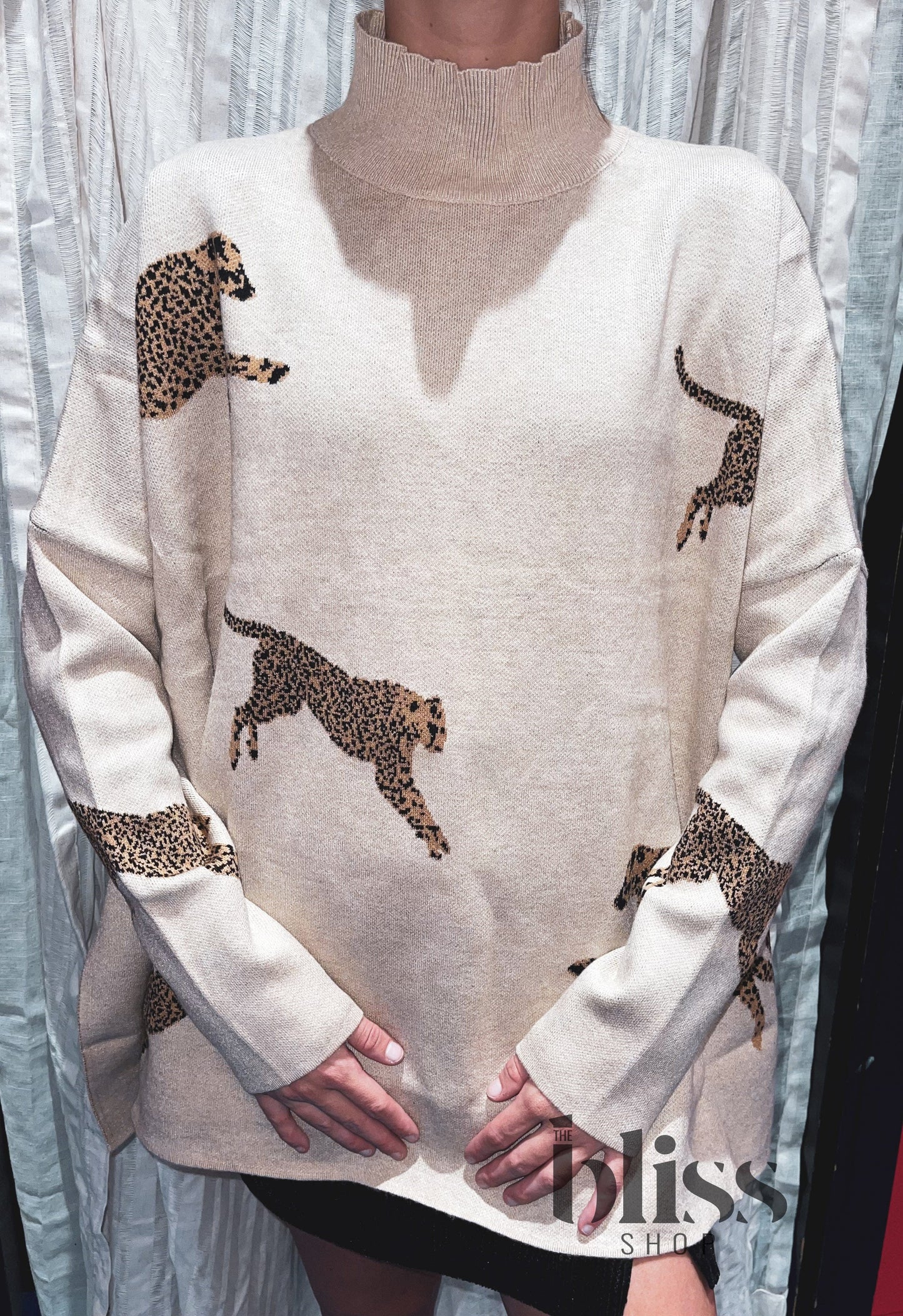 Leaping Leopard Turtleneck
