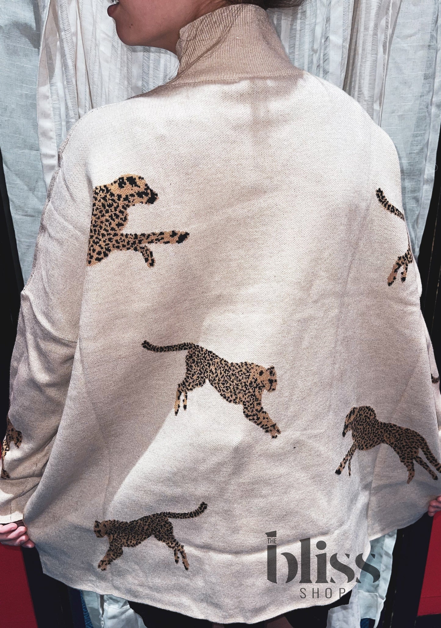 Leaping Leopard Turtleneck